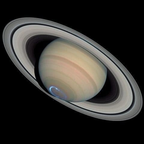 You can see a giant 'hole' shoot across Saturn this summer — and it won't happen again until 2040
