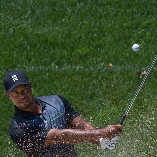 Tiger Woods & Charlie Woods share a laugh after the latter's impressive putt at Pinehurst CC